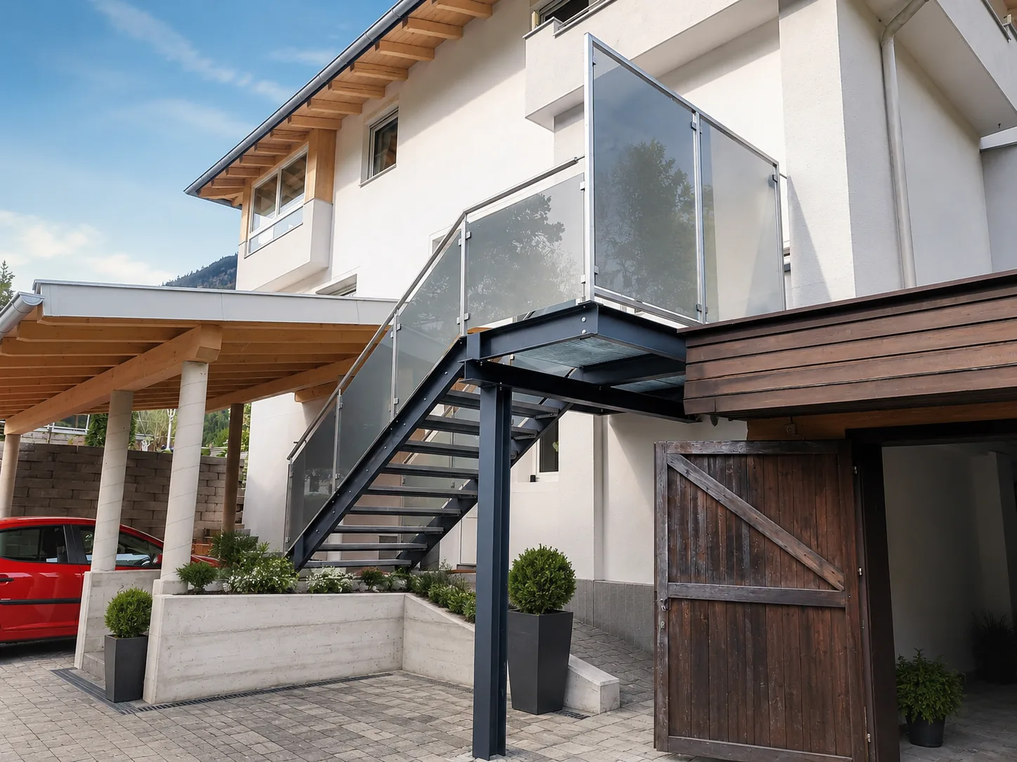 Außentreppe aus Metall mit Glasgeländer von Optimetall